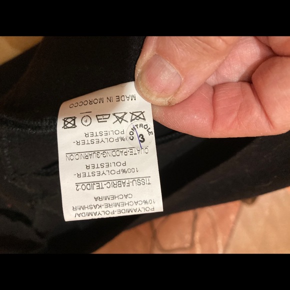 An interesting black warm jacket - Picture 7 of 16